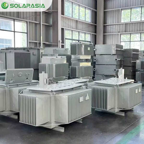 Inside our transformer manufacturing factory showing skilled technicians performing final checks on a oil immersed transformer before shipment.