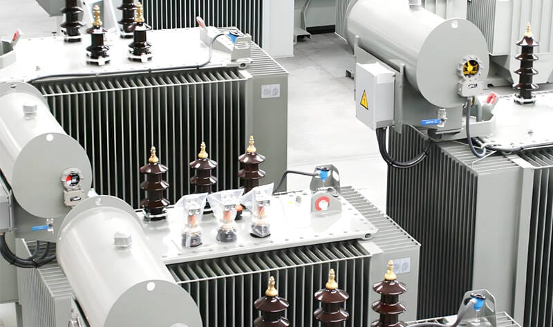 A single 400KVA oil immersed transformer undergoing final checks on the factory floor.