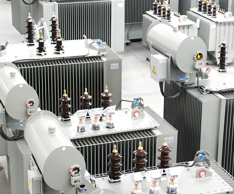 A single 400KVA oil immersed transformer undergoing final checks on the factory floor.