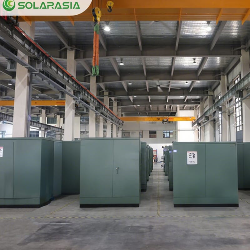 Row of completed 750KVA Pad Mounted Transformers in the factory yard awaiting shipment.