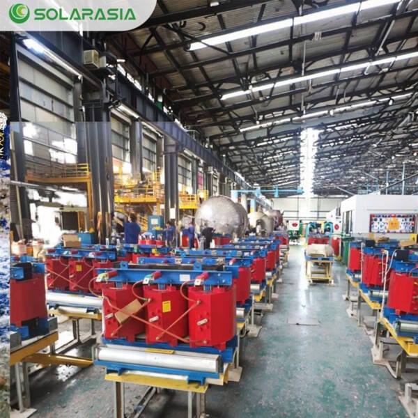 Wide shot showing multiple Dry Type Transformers, including a 2500KVA model, in a factory or testing facility, demonstrating manufacturing scale and capability.