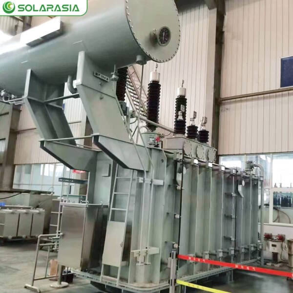 Skilled technicians conducting rigorous final tests on an 800KVA oil immersed transformer on the production floor.