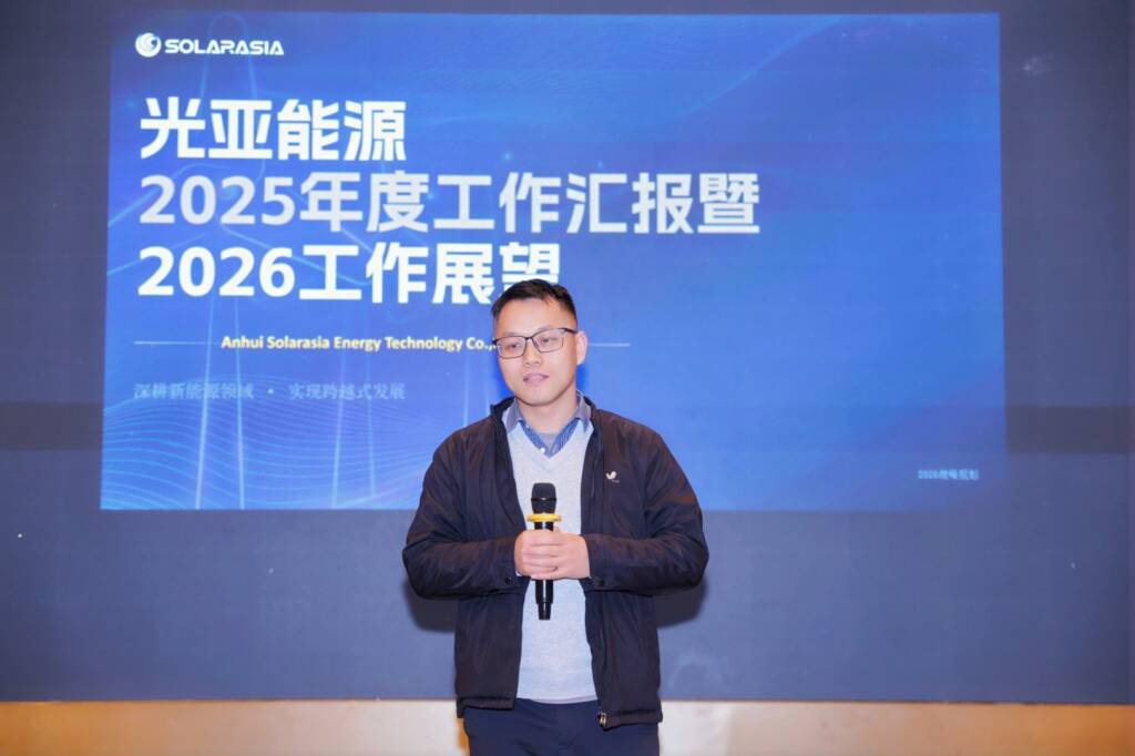 company management presenting annual review at transformer manufacturing company meeting