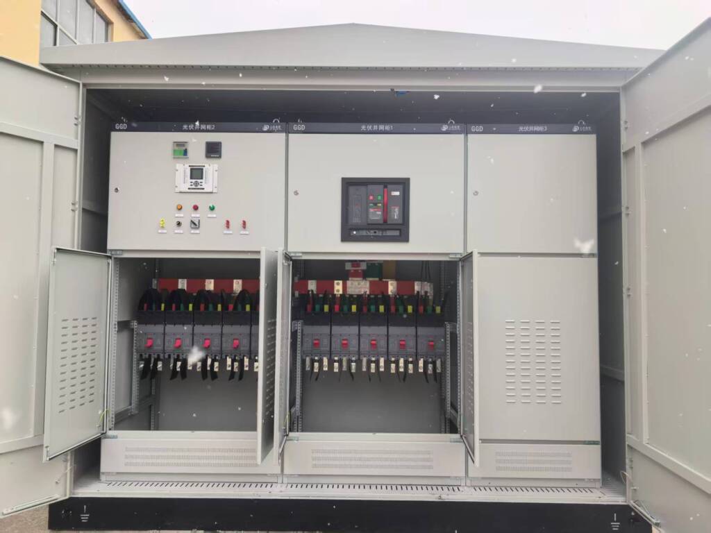 Engineers inspecting 3150 kVA box substation during production
