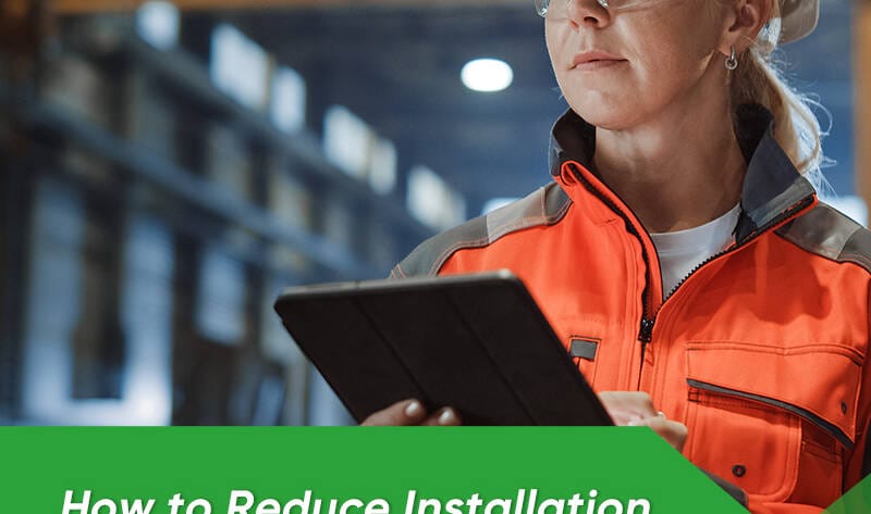 A modern prefabricated substation unit being lowered onto a concrete foundation at a large industrial site, highlighting rapid deployment.